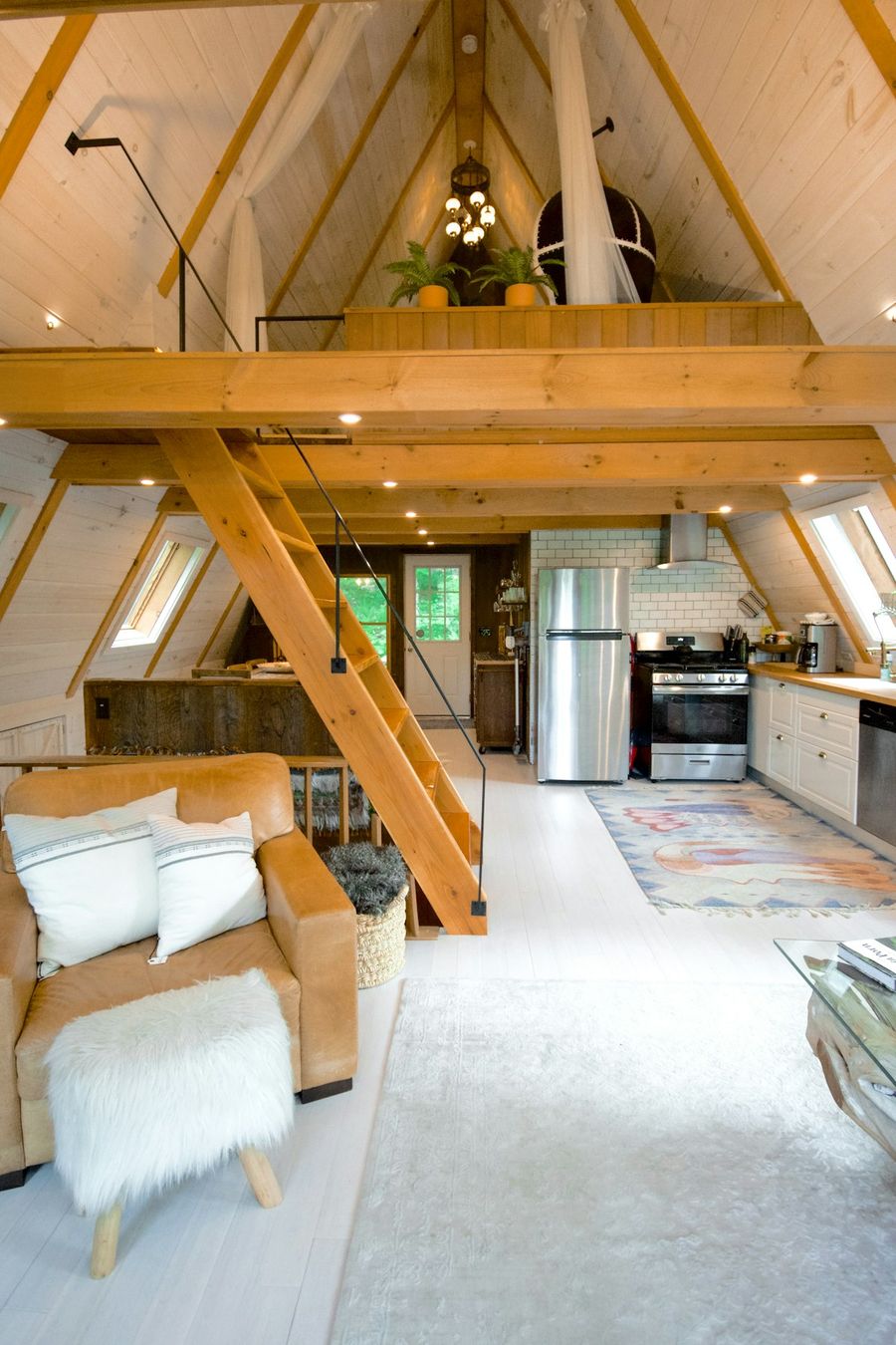 An interior with its timber roof structure left exposed