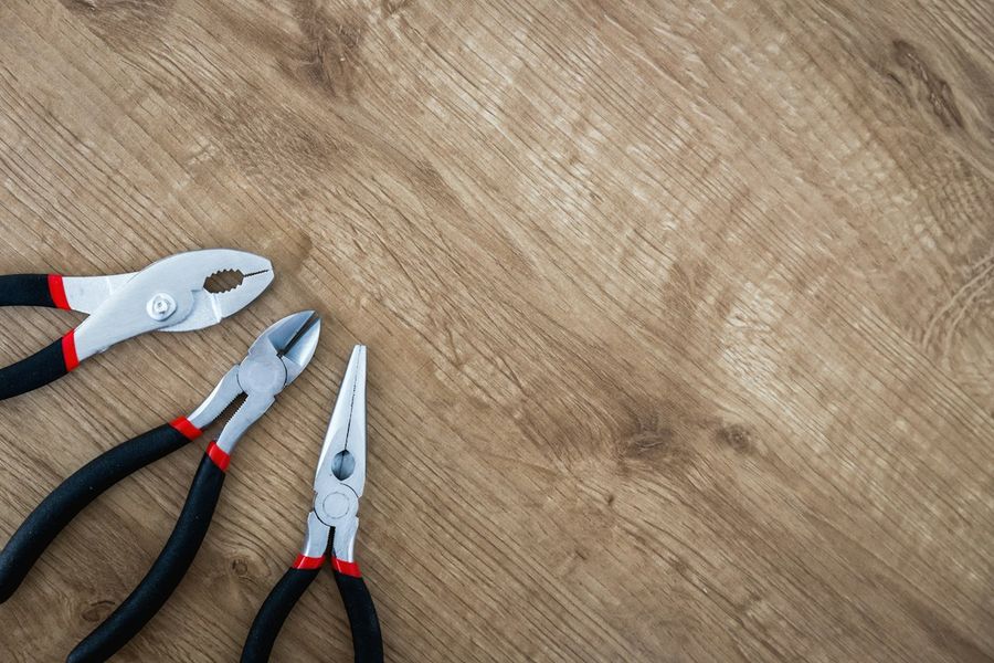 Hand tools resting on new timber flooring